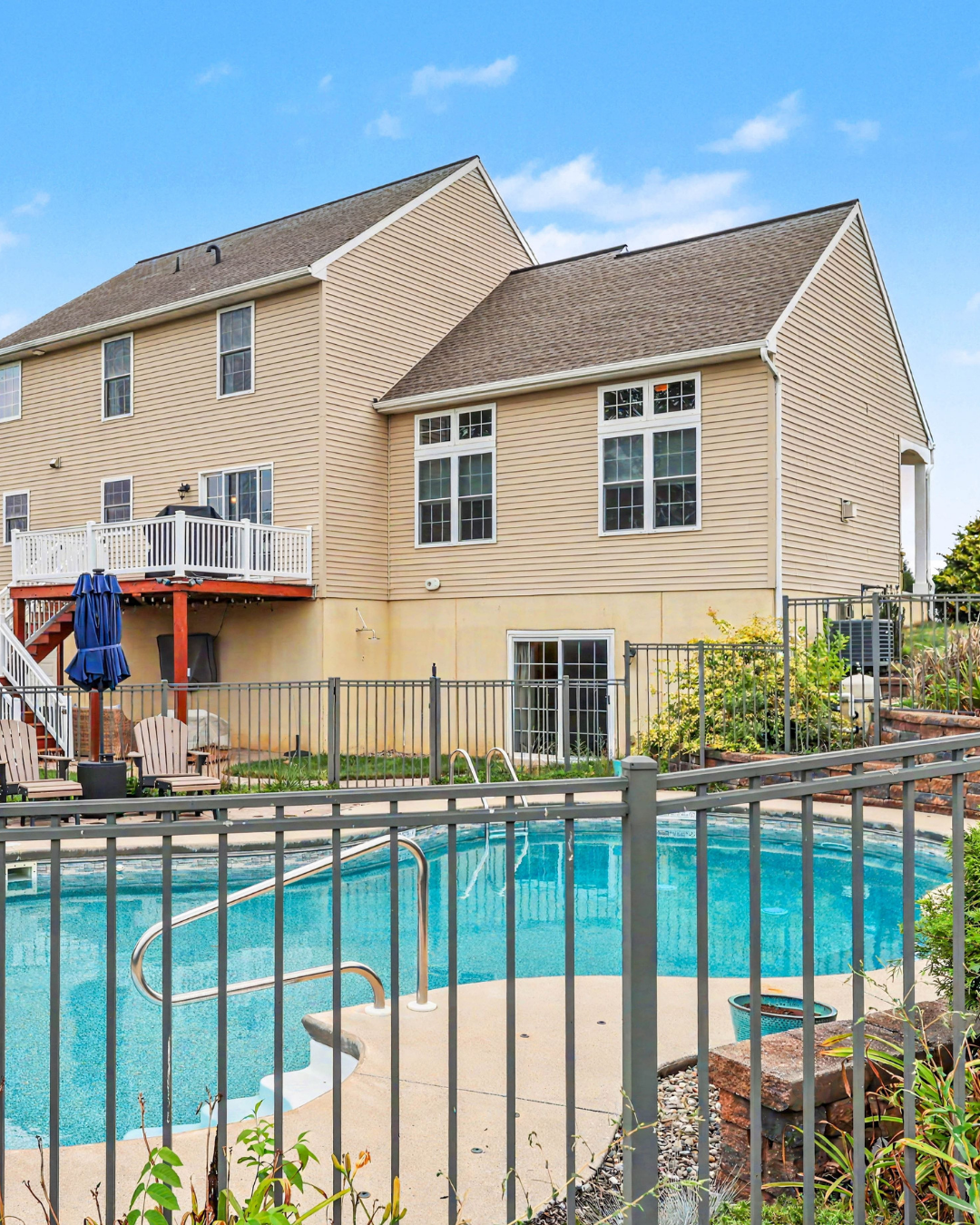 In-ground pool with fenced yard